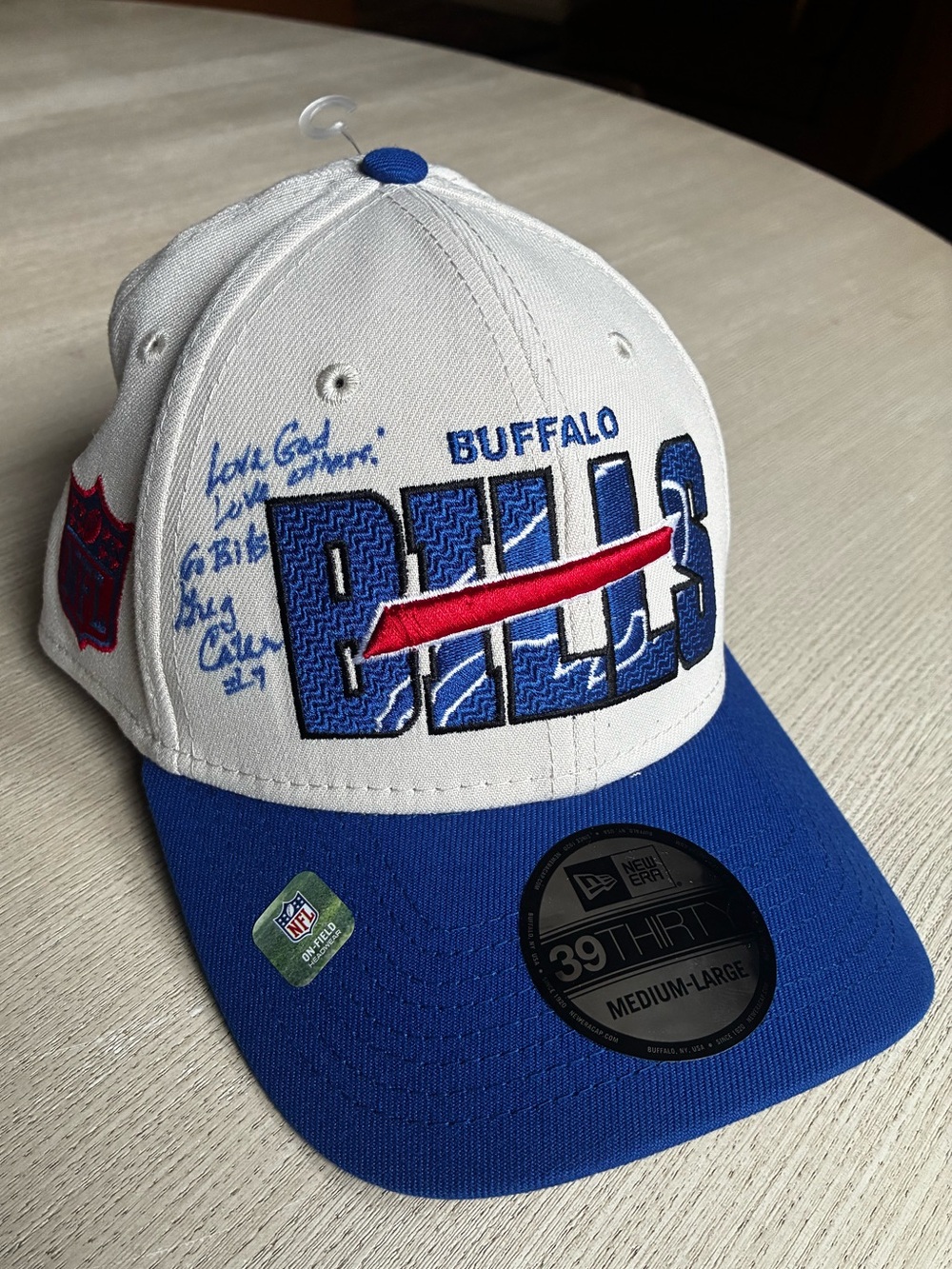 NEW Buffalo Bills New Era medium/large stretch hat. Signed by Greg Cater